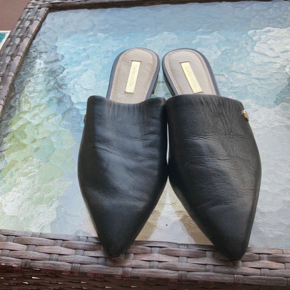 EUC, Beautiful Soft black leather w/Gold emblem on